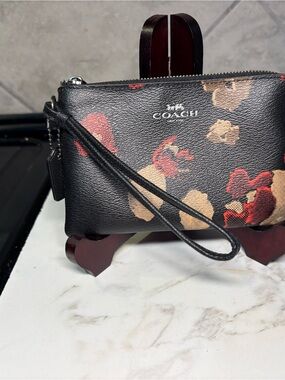 COACH Black Floral Print Wristlet with Red & Tan Accents